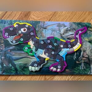 PICK ANY 3 ITEMS FOR $10 - SUNKIDZ WOOD ABC DINO PUZZLE